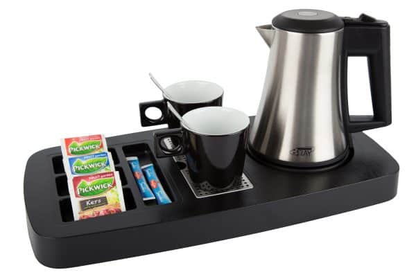 Welcome tray for hotels with a brushed stainless steel hotel water kettle and black cappuccino cups