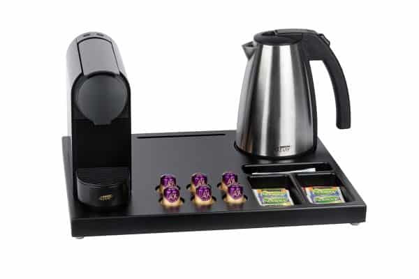 Welcome tray set of wood with hotel kettle and black capsule coffee machine