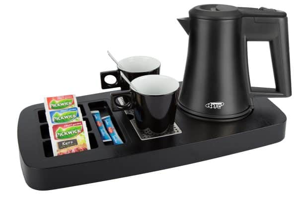 Welcome tray for hotels in black plastic with a wood structure finish with black hotel kettle and black coffee cups
